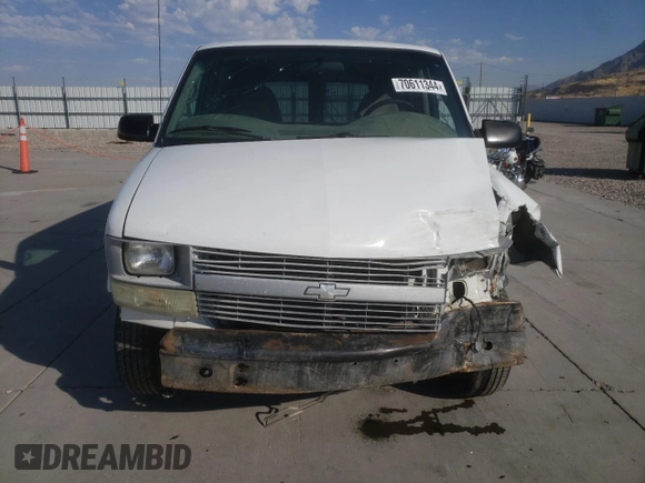 2004 Chevrolet Astro Cargo z VIN 1GCDL19X64B109975, wystawiony jako Copart lot #70611344 z przebiegiem 129 682 mil mil oraz Szkoda całkowita • Salvage title. Historia ofert i sprzedaży dostępna na DreamBid. Obrazek 5.