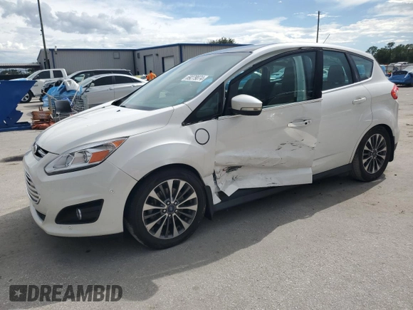 2017 Ford C-Max Energi Titanium with VIN 1FADP5FU9HL100117, listed as a Copart auction lot 69279074 with 153,601 mi miles and Salvage Title. Bid and sale history available at carsss.com. Image 1.