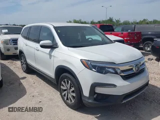 2021 Honda Pilot EX z VIN 5FNYF5H34MB006016, wystawiony jako IAAI lot #42174645 z przebiegiem 51 889 mil mil oraz . Historia ofert i sprzedaży dostępna na DreamBid. Obrazek 1.