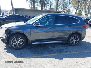 2018 BMW X1 sDrive28i with VIN WBXHU7C36J5L05628, listed as a IAAI auction lot 41708522 with 91,352 mi miles and . Bid and sale history available at DreamBid. Image 15.