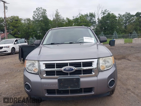 2008 Ford Escape XLS z VIN 1FMCU02Z48KC24526, wystawiony jako IAAI lot #42605206 z przebiegiem 119 311 mil mil oraz . Historia ofert i sprzedaży dostępna na DreamBid. Obrazek 6.