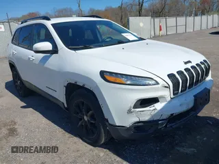 2014 Jeep Cherokee Latitude with VIN 1C4PJMCS9EW309289, listed as a IAAI auction lot 42003252 with 99,360 mi miles and . Bid and sale history available at DreamBid. Image 1.