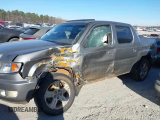 2010 Honda Ridgeline RTL with VIN 5FPYK1F52AB004678, listed as a IAAI auction lot 41661968 with 169,021 mi miles. Bid and sale history available at carsss.com. Image 14.