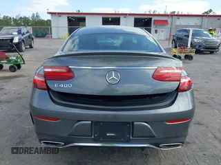 2018 Mercedes-Benz E 400 with VIN WDD1J6FB9JF015064, listed as a IAAI auction lot 42165914 with 95,290 mi miles and . Bid and sale history available at DreamBid. Image 17.