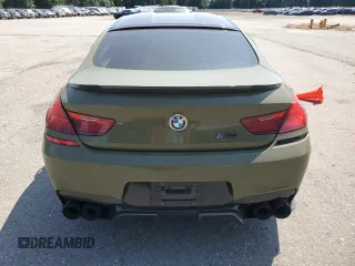 2017 BMW M6 z VIN WBS6E9C53HG437414, wystawiony jako Copart lot #61141685 z przebiegiem 89 893 mil mil oraz Szkoda całkowita • Salvage title. Historia ofert i sprzedaży dostępna na DreamBid. Obrazek 6.