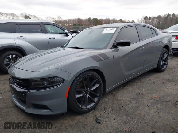 2019 Dodge Charger SXT with VIN 2C3CDXBG6KH667548, listed as a IAAI auction lot 41114669 with 112,233 mi miles. Bid and sale history available at carsss.com. Image 2.