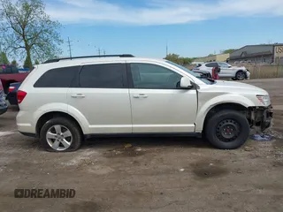 2012 Dodge Journey SXT with VIN 3C4PDCBG4CT372642, listed as a IAAI auction lot 42238499 with 172,033 mi miles and . Bid and sale history available at DreamBid. Image 14.