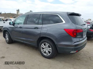 2016 Honda Pilot LX with VIN 5FNYF5H14GB037205, listed as a IAAI auction lot 42034018 with 101,943 mi miles and . Bid and sale history available at DreamBid. Image 3.