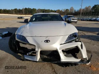 2021 Toyota Supra 3.0 z VIN WZ1DB0C08MW045912, wystawiony jako Copart lot #49248065 z przebiegiem Nie podano mil oraz Nie do naprawy • Non repairable. Historia ofert i sprzedaży dostępna na DreamBid. Obrazek 5.