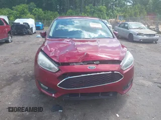 2015 Ford Focus SE z VIN 1FADP3F25FL313033, wystawiony jako IAAI lot #42206507 z przebiegiem 142 938 mil mil oraz . Historia ofert i sprzedaży dostępna na DreamBid. Obrazek 6.