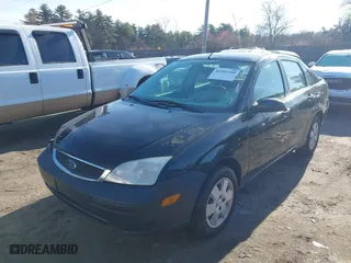 2007 Ford Focus S with VIN 1FAHP34N07W166828, listed as a IAAI auction lot 41992308 with 143,169 mi miles. Bid and sale history available at carsss.com. Image 2.