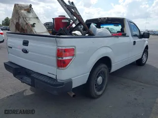 2014 Ford F-150 XL with VIN 1FTMF1CM6EKD40608, listed as a IAAI auction lot 40650148 with 163,333 mi miles. Bid and sale history available at carsss.com. Image 4.