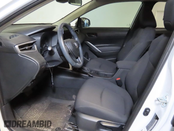 2023 Toyota Corolla Cross LE with VIN 7MUCAAAG2PV052111, listed as a Copart auction lot 64481675 with 18,125 mi miles and Salvage title. Bid and sale history available at DreamBid. Image 9.