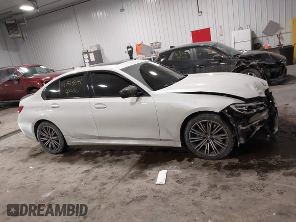 2020 BMW 3 Series M340i xDrive with VIN WBA5U9C08LFJ73063, listed as a IAAI auction lot 41513641 with 52,431 mi miles and . Bid and sale history available at DreamBid. Image 13.
