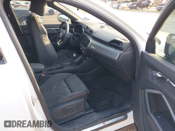 2022 Audi Q3 S line Premium Plus with VIN WA1EECF35N1063231, listed as a IAAI auction lot 41941891 with 43,891 mi miles and . Bid and sale history available at DreamBid. Image 5.