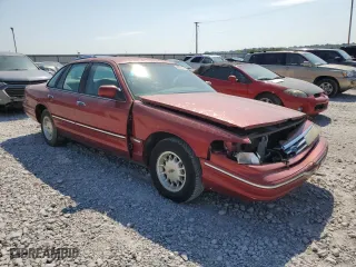 1997 Ford Crown Victoria LX with VIN 2FALP74W7VX148869, listed as a Copart auction lot 69004924 with 226,648 mi miles and Salvage Title. Bid and sale history available at carsss.com. Image 4.