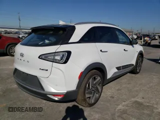 2022 Hyundai NEXO Limited z VIN KM8J84A65NU026354, wystawiony jako Copart lot #63148383 z przebiegiem 14 279 mil mil oraz . Historia ofert i sprzedaży dostępna na DreamBid. Obrazek 3.