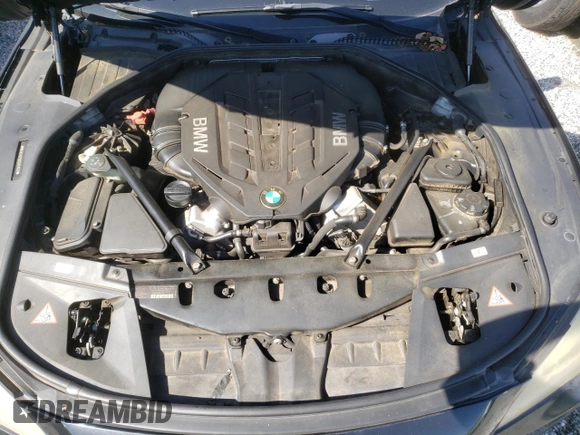 2012 BMW 7 Series 750i with VIN WBAKA8C59CDX01027, listed as a Copart auction lot 57881955 with 171,992 mi miles and Clean title. Bid and sale history available at DreamBid. Image 11.