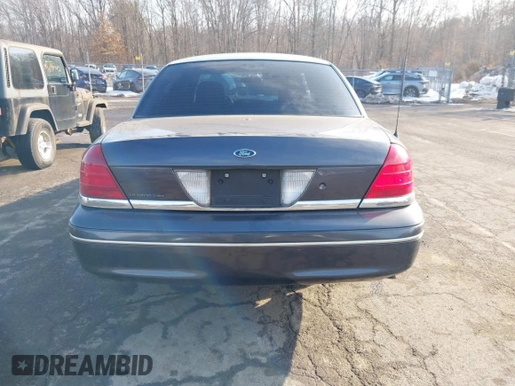 2005 Ford Police Interceptor z VIN 2FAHP71W95X170821, wystawiony jako IAAI lot #41538727 z przebiegiem 115 722 mil mil oraz . Historia ofert i sprzedaży dostępna na DreamBid. Obrazek 16.