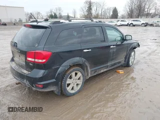 2013 Dodge Journey R/T with VIN 3C4PDDFG7DT724534, listed as a IAAI auction lot 41161346 with 175,606 mi miles and . Bid and sale history available at DreamBid. Image 4.
