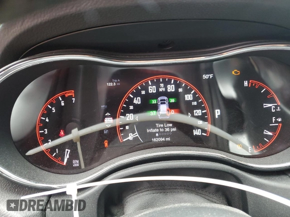 2014 Dodge Durango Limited z VIN 1C4RDJDGXEC593042, wystawiony jako Copart lot #56348355 z przebiegiem 162 094 mil mil oraz Szkoda całkowita • Salvage title. Historia ofert i sprzedaży dostępna na DreamBid. Obrazek 9.