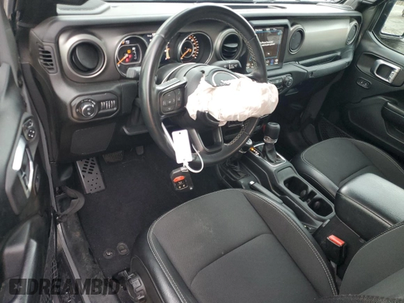 2021 Jeep Gladiator Sport S с VIN 1C6JJTAG1ML562354, выставлен на аукционе Copart как лот 54850185 с пробегом 67 473 миль миль и На запчасти • Non repairable. История ставок и продаж доступна на DreamBid. Изображение 8.