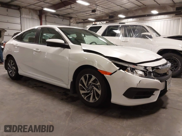 2018 Honda Civic EX with VIN 19XFC2F74JE005647, listed as a IAAI auction lot 41938607 with 90,263 mi miles and . Bid and sale history available at DreamBid. Image 1.