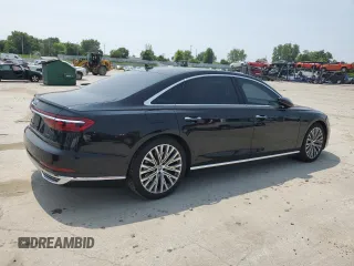 2019 Audi A8 with VIN WAU8DAF82KN020487, listed as a Copart auction lot 60214005 with 75,895 mi miles and Salvage title. Bid and sale history available at DreamBid. Image 3.