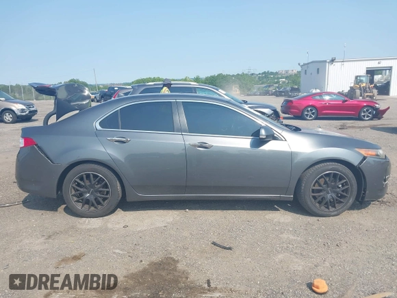 2009 Acura TSX z VIN JH4CU26609C033244, wystawiony jako IAAI lot #42400966 z przebiegiem 80 487 mil mil oraz . Historia ofert i sprzedaży dostępna na DreamBid. Obrazek 12.