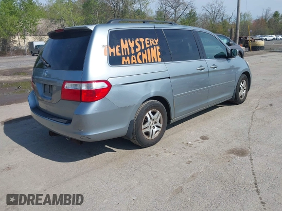 2006 Honda Odyssey EX-L with VIN 5FNRL38656B120539, listed as a IAAI auction lot 42190857 with 242,152 mi miles. Bid and sale history available at carsss.com. Image 4.