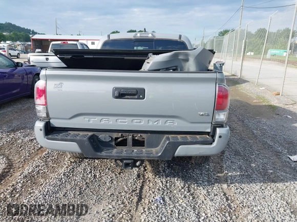 2021 Toyota Tacoma SR with VIN 5TFCZ5AN7MX255512, listed as a IAAI auction lot 42497907 with 50,563 mi miles and . Bid and sale history available at DreamBid. Image 17.