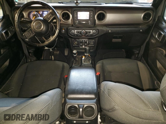 2020 Jeep Wrangler Unlimited Black and Tan with VIN 1C4HJXDG9LW331418, listed as a Copart auction lot 56414765 with 125,339 mi miles and Salvage title. Bid and sale history available at DreamBid. Image 8.