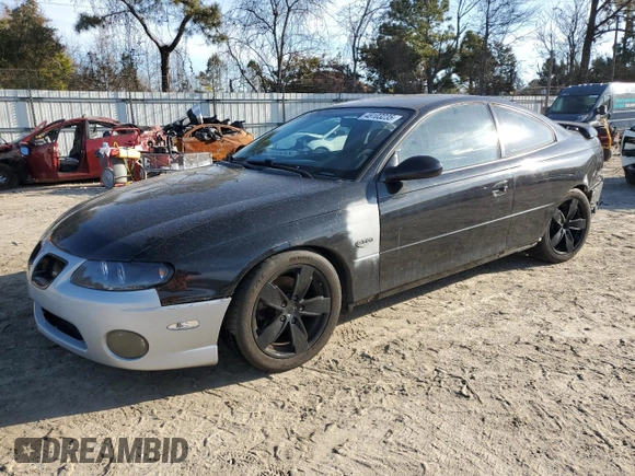 2004 Pontiac GTO z VIN 6G2VX12G74L249425, wystawiony jako Copart lot #48103235 z przebiegiem 106 334 mil mil oraz Szkoda całkowita • Salvage title. Historia ofert i sprzedaży dostępna na DreamBid. Obrazek 1.