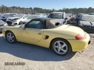 1998 Porsche Boxster z VIN WP0CA2982WU623104, wystawiony jako Copart lot #83398714 z przebiegiem Nie podano mil oraz Czysty tytuł • Clean title. Historia ofert i sprzedaży dostępna na DreamBid. Obrazek 2.
