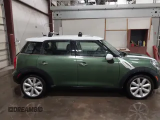 2015 MINI Countryman with VIN WMWZB3C50FWR43714, listed as a IAAI auction lot 41589778 with 93,404 mi miles and . Bid and sale history available at DreamBid. Image 13.