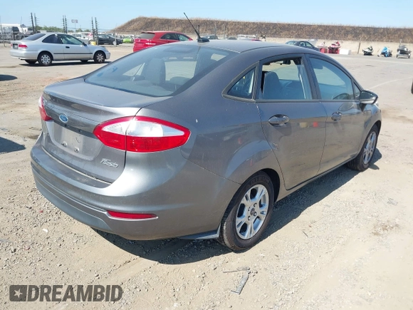 2014 Ford Fiesta SE z VIN 3FADP4BJ6EM117845, wystawiony jako IAAI lot #42431152 z przebiegiem 97 742 mil mil oraz . Historia ofert i sprzedaży dostępna na DreamBid. Obrazek 4.