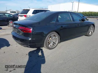 2017 Audi A8 with VIN WAU44AFD0HN017821, listed as a IAAI auction lot 41676097 with 107,378 mi miles and . Bid and sale history available at DreamBid. Image 4.