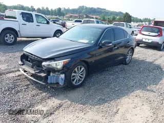 2015 Infiniti Q50 Premium with VIN JN1BV7AP5FM334429, listed as a IAAI auction lot 42389298 with 146,126 mi miles and . Bid and sale history available at DreamBid. Image 2.