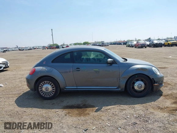 2014 Volkswagen Beetle 2.5L with VIN 3VWJX7AT7EM608634, listed as a IAAI auction lot 41783090 with 139,106 mi miles and . Bid and sale history available at DreamBid. Image 13.