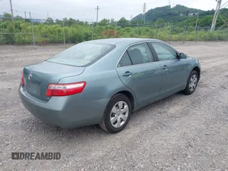 2007 Toyota Camry CE z VIN 4T1BE46K67U709282, wystawiony jako IAAI lot #42534594 z przebiegiem 156 794 mil mil oraz . Historia ofert i sprzedaży dostępna na DreamBid. Obrazek 4.