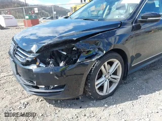2015 Volkswagen Passat 1.8T Sport with VIN 1VWBT7A35FC062984, listed as a IAAI auction lot 42053939 with 106,095 mi miles. Bid and sale history available at carsss.com. Image 6.