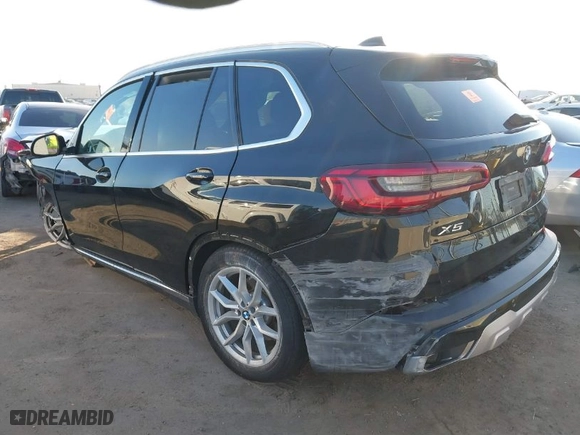 2020 BMW X5 sDrive40i with VIN 5UXCR4C0XLLW65026, listed as a IAAI auction lot 41048999 with 70,052 mi miles. Bid and sale history available at carsss.com. Image 3.