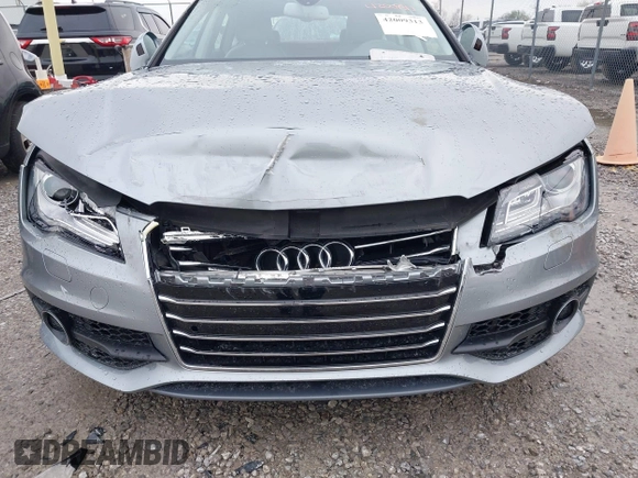 2012 Audi A7 Prestige with VIN WAU2GAFC9CN135476, listed as a IAAI auction lot 42009313 with 101,885 mi miles and . Bid and sale history available at DreamBid. Image 6.