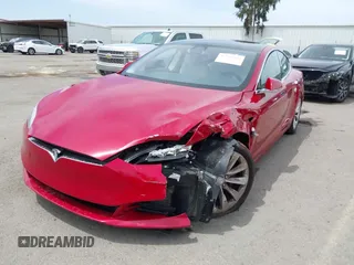 2018 Tesla Model S 75D with VIN 5YJSA1E29JF273494, listed as a IAAI auction lot 42246104 with 93,870 mi miles and . Bid and sale history available at DreamBid. Image 6.