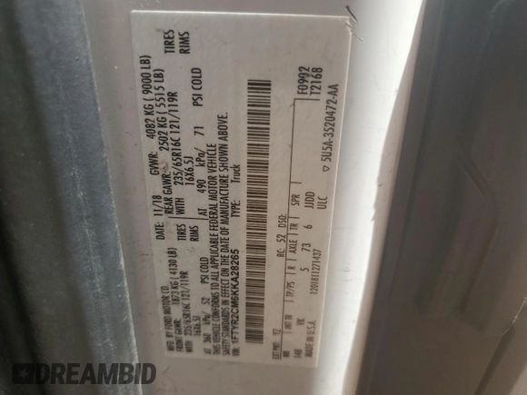 2019 Ford Transit z VIN 1FTYR2CM6KKA28265, wystawiony jako Copart lot #56937345 z przebiegiem 106 541 mil mil oraz Szkoda całkowita • Salvage title. Historia ofert i sprzedaży dostępna na DreamBid. Obrazek 13.