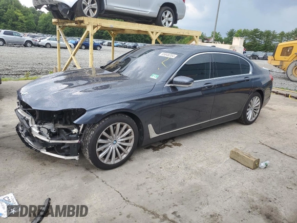 2017 BMW 7 Series 740i xDrive with VIN WBA7E4C32HGU99963, listed as a Copart auction lot 65848354 with 99,396 mi miles and Salvage Title. Bid and sale history available at carsss.com. Image 1.