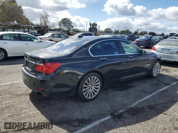 2012 BMW 7 Series 750i with VIN WBAKA8C57CDS99976, listed as a Copart auction lot 45202715 with 152,169 mi miles and Salvage title. Bid and sale history available at DreamBid. Image 3.