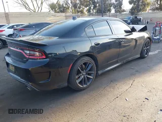 2019 Dodge Charger GT with VIN 2C3CDXHGXKH597477, listed as a IAAI auction lot 41840022 with 81,671 mi miles and . Bid and sale history available at DreamBid. Image 4.