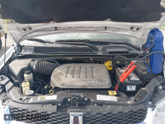 2016 Dodge Grand Caravan SXT with VIN 2C4RDGCG9GR380632, listed as a IAAI auction lot 42239479 with 197,316 mi miles and . Bid and sale history available at DreamBid. Image 10.