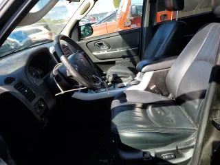 2005 Mercury Mariner Luxury with VIN 4M2CU57135DJ21208, listed as a Copart auction lot 53555425 with 95,409 mi miles and Salvage Title. Bid and sale history available at carsss.com. Image 7.